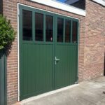 Openslaande garagedeuren Berger Luxe Line Twin Satin Plancha glaspaneel RAL 6009